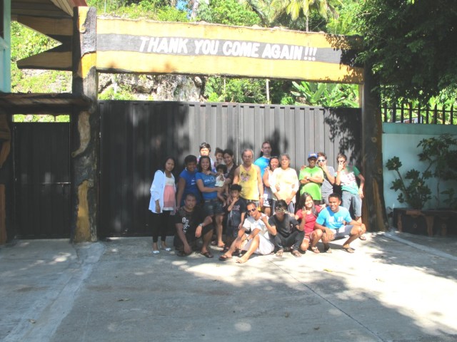 Group picture of family, friends and employees. 